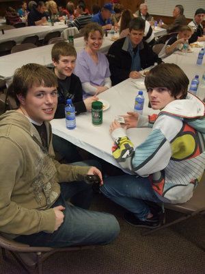 Image: Youth council — The Mayor of the Smithfield City Youth Council, Nate Hanks (front) with members Cameron Woodward (black shirt) and Tanner Law (right). Tammy Law (purple shirt) is an advisor to the council.