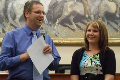 Image: Christyn Kendrick — Troy Pugmire announcing Christyn Kendrick as Summit elementary’s teacher of the year.
