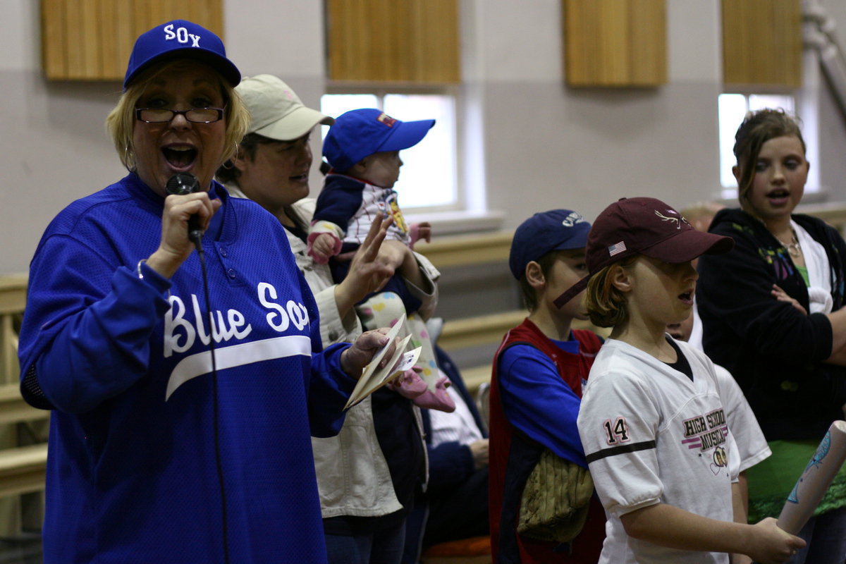 Image: 7th inning stretch — Whitman singing a very special version of Take Me Out To The Ballgame.