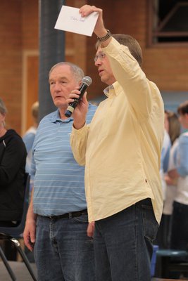 Image: Lloyd Berentzen, booster club president, recognizing Sky View’s athletic director, Jan Hall
