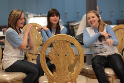 Image: Students demonstrate donated dinette set