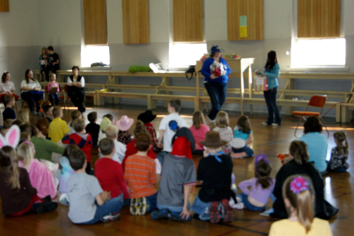 Image: Families sit down to enjoy Smithfield Library’s Dr. Seuss Celebration!