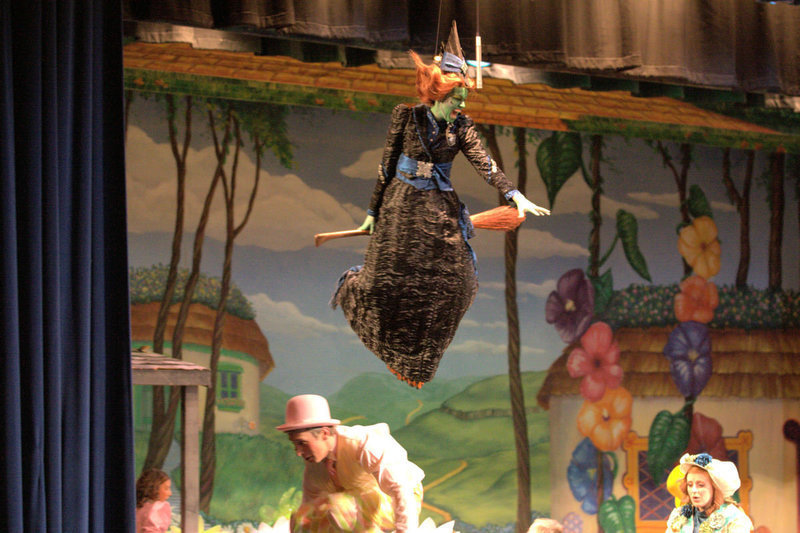 Image: The Wicked Witch of the West (Skyler Little) Flies in to see what happened to her sister.