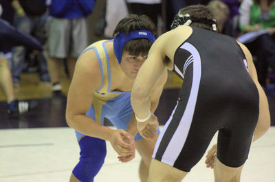 Image: Abraham Herrera ready to make a move on his opponent at the Divisional Tournament