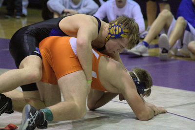 Image: Chet Anderson taking down his man at the Divisional Tournament