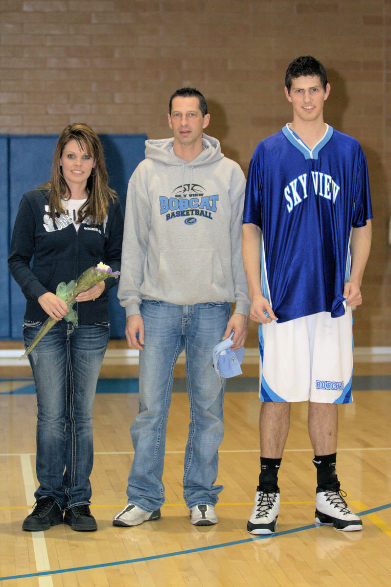 Image: Senior night with parents — Riley Jensen (#55)