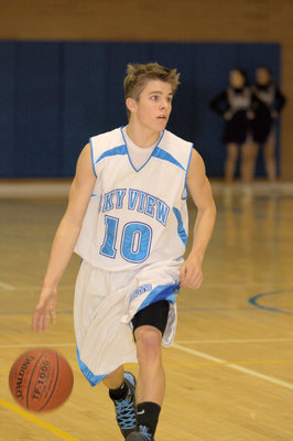 Image: Riley Knowles (#10) bringing the ball down court
