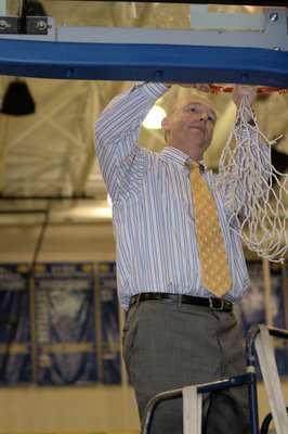 Image: Region Champions! Coach Kevin Anderson cutting down the net after the game