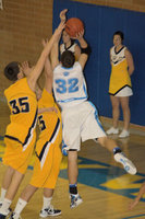 Image: Casey Oliverson (#32) — Driving for 2 of his 21 points