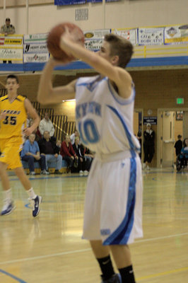 Image: Riley Knowles (#10) — Shooting one of two back to back 3 pointers