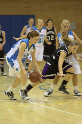 Image: Maddie Day (#23) stealing the ball