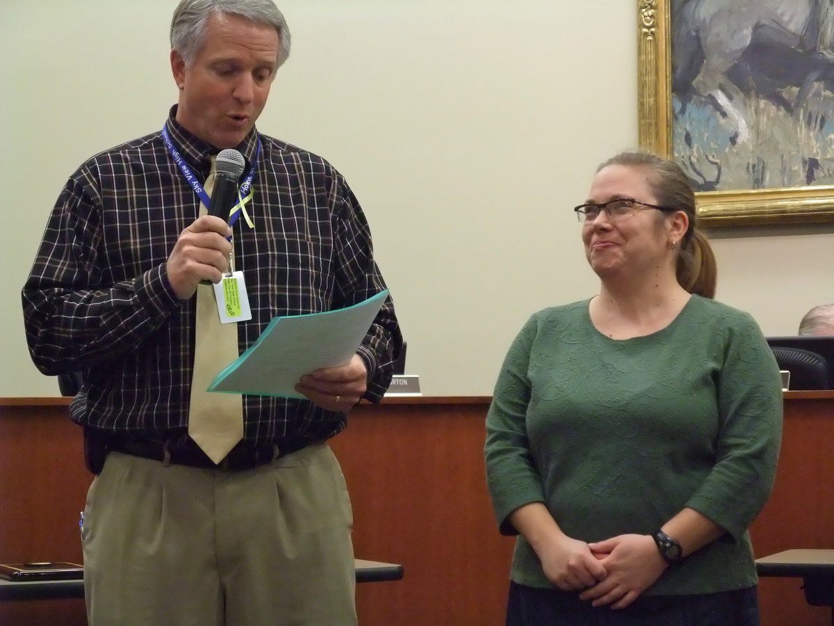 Image: Principal David Swenson presenting Stephanie Walker with the Sky View High School Teacher of The Year