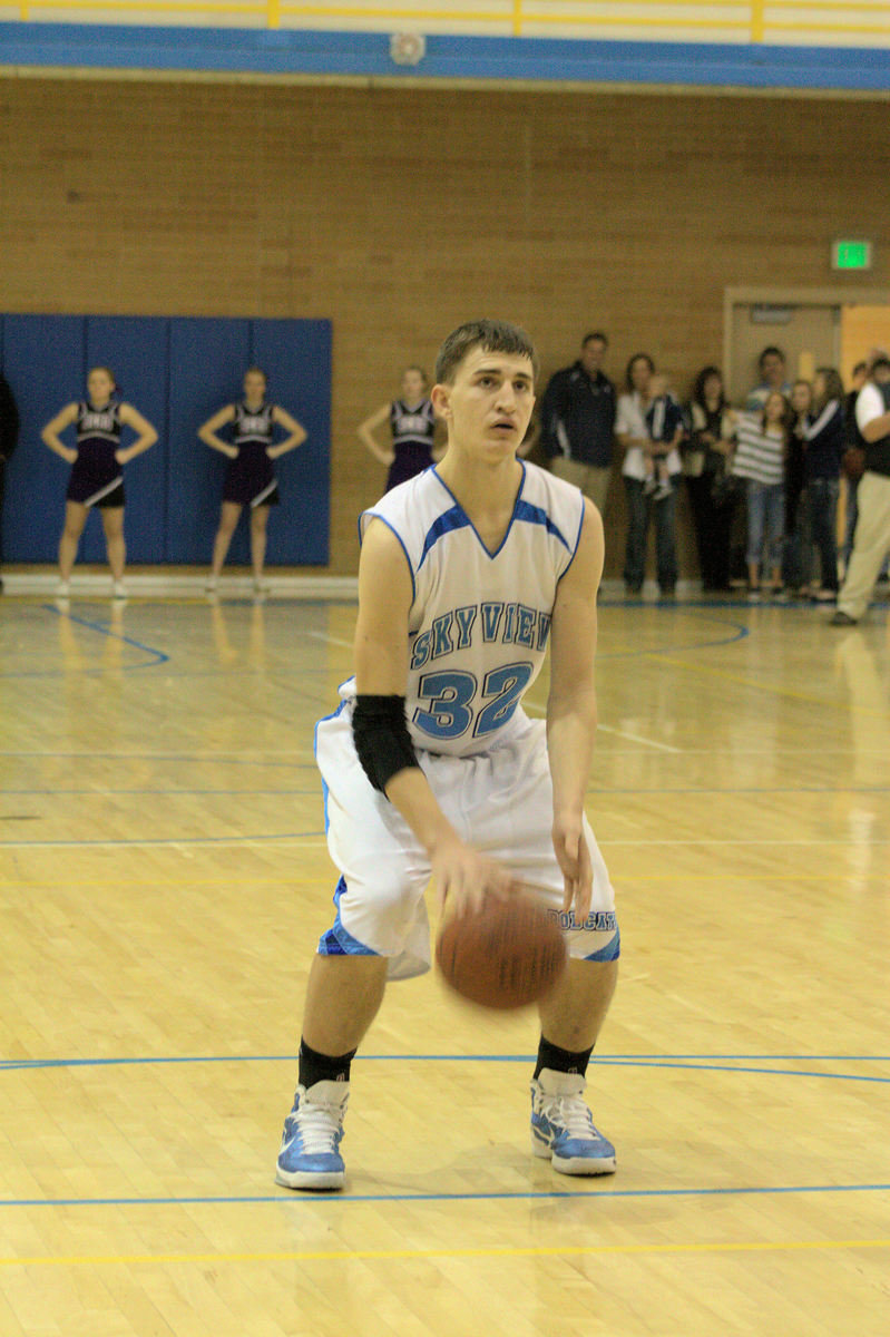 Image: Casey Oliverson (#32) shooting the game winning point