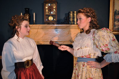 Image: Disagreement — Helen O’Neill (Kelby Partridge) and Mrs. Eastwood (Shellie Lusk)
