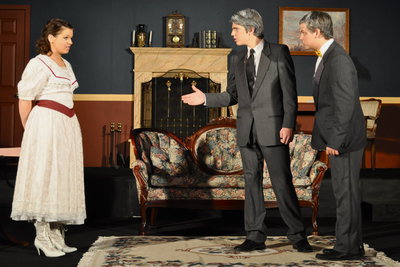 Image: Can’t shake hands — Rose (Cami Trappett) won’t shake the hands of her dad’s boss, Mr. Dodge (Grant Fuller) because of her “special” handshake while Dodge’s crony, Duffy (Brock Wilson) looks on in disgust.