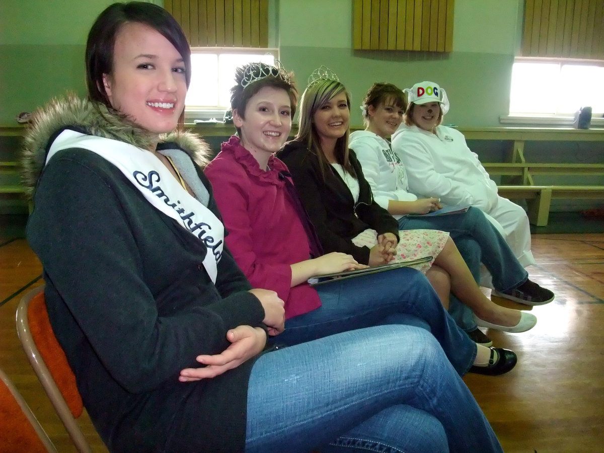 Image: Readers — Courtney Blair, Erin Roberts, Hillary Hogan, Melissa Potts and Karen Bowling waiting their turn to read to the children.