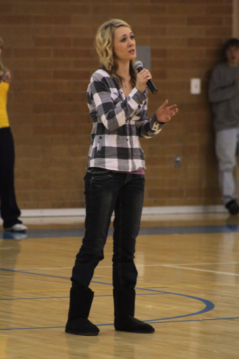 Image: Celeste Jenkins — Senior Celeste Jenkins sings the National Anthem