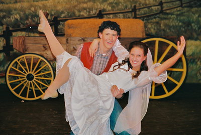 Image: Dream dancing — Nathan Johnson and Taylor Valdez dance together as Curly McLain and Laurey Williams during the dream sequence.