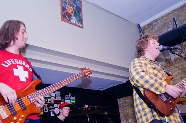 Image: Why Sound — Colton Anderson, bass; Gavin Howe, drums; and Benton Wood, vocals and guitar perform at Why Sound in downtown Logan.