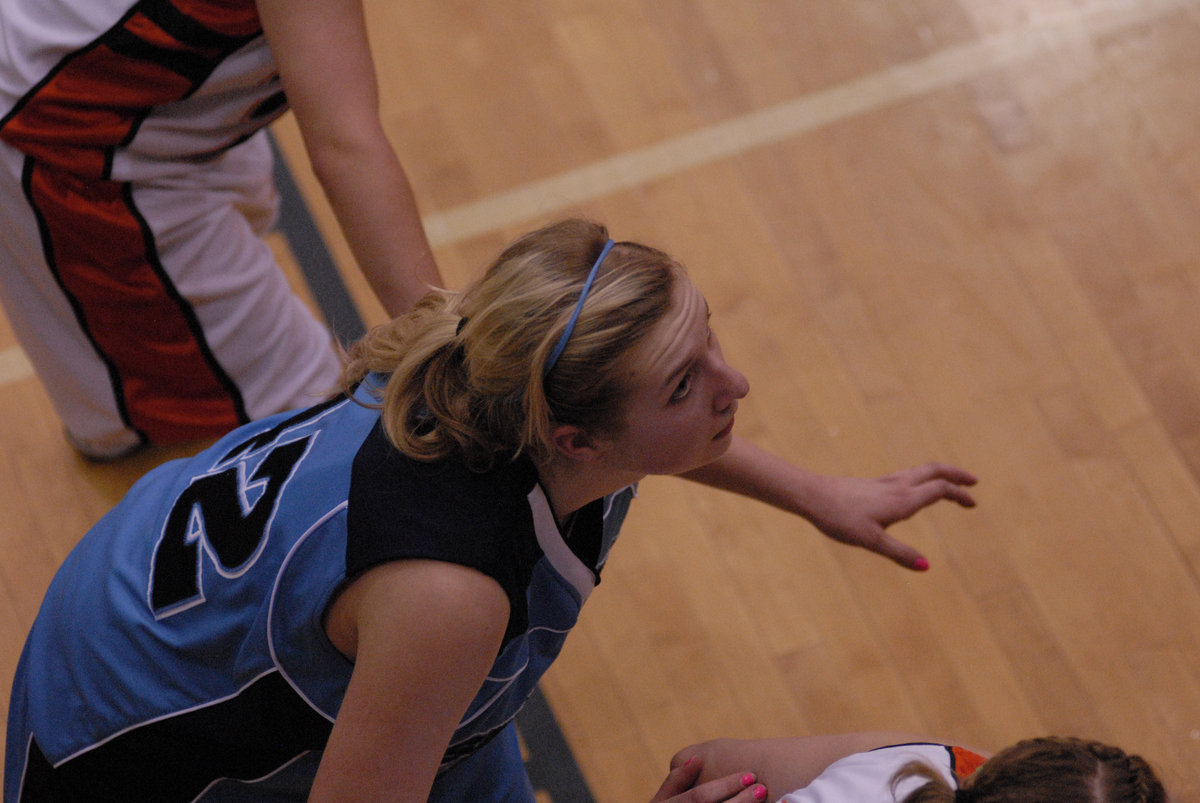 Image: Aubry Boehme — Senior center/forward Aubry Boehme watches for the rebound during a teamate’s foul shot.