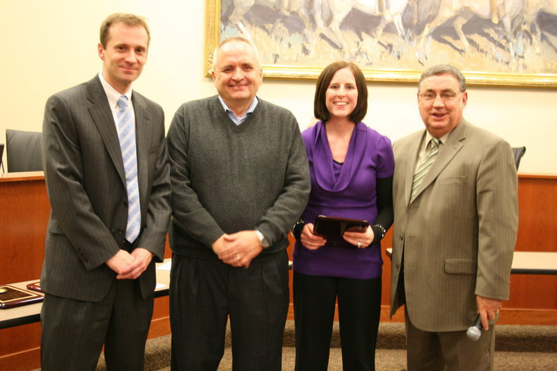 Image: Amy Bassett — Jonathan Jenkins, board president; Greg Larsen, principal; Amy Bassett, teacher; and Steve Norton, superintendent. Amy with her award as Teacher of the Year for Mountainside elementary school.