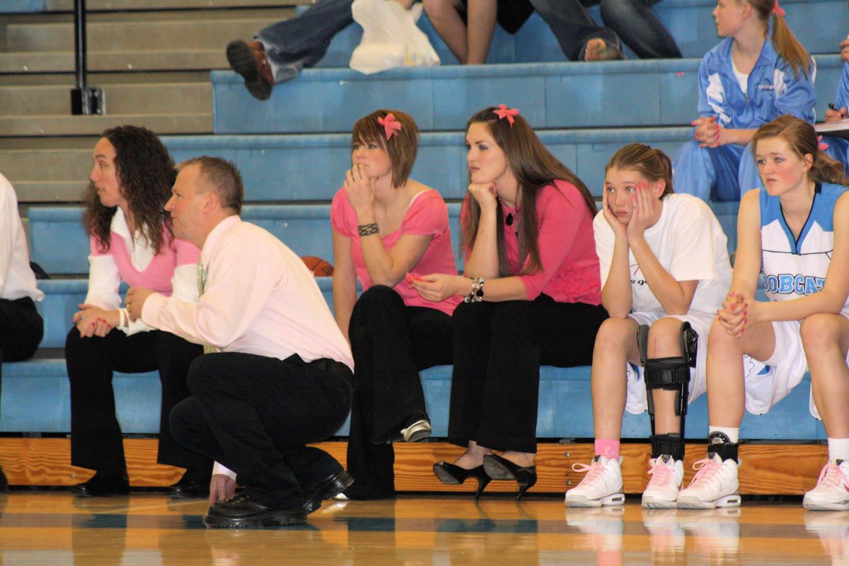 Image: Wearing pink — Both teams wore pink for breast cancer awareness.