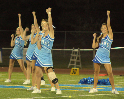 Image: Cheerleaders — The cheerleaders at halftime
