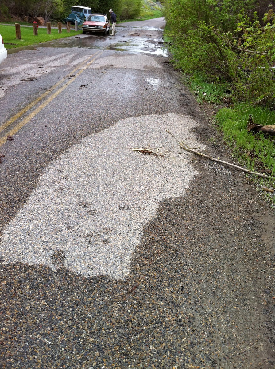 Image: At midnight the culvert plugged and ran water down Canyon Road.