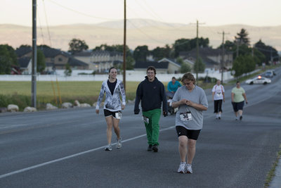 Image: 5K participants starting off early in the morning.
