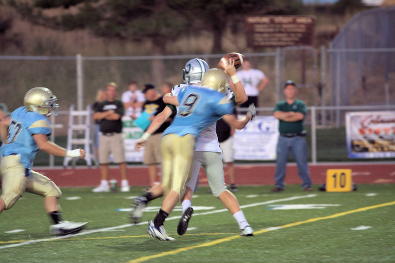 Image: Garth Jolley harrassing the quarterback.