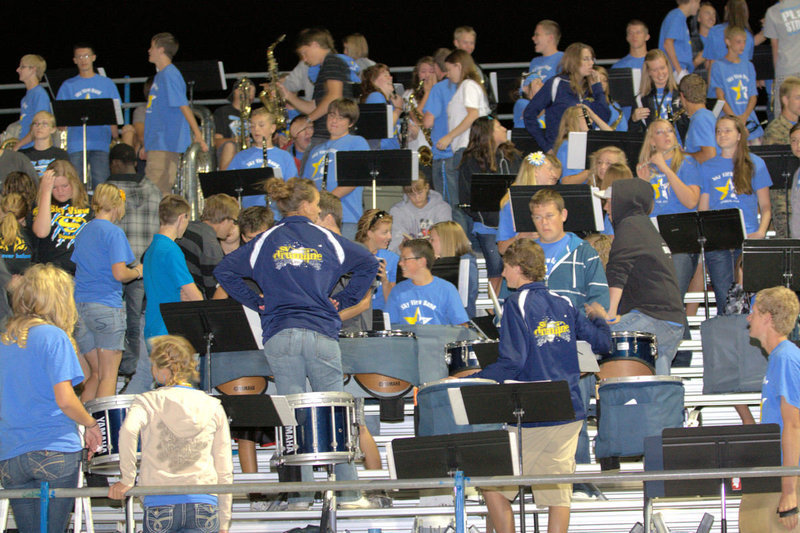 Image: The pep band supports the team.