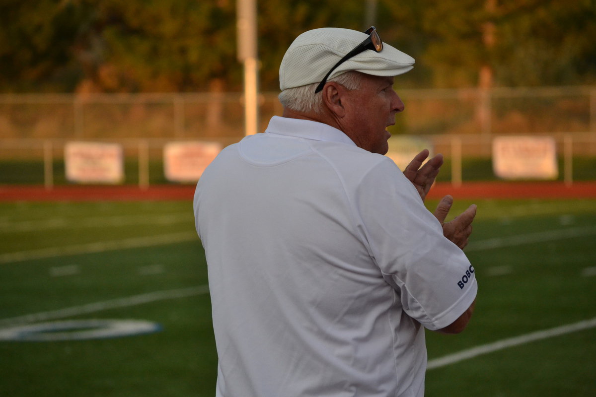 Image: Coach Geddes prepares for the game.