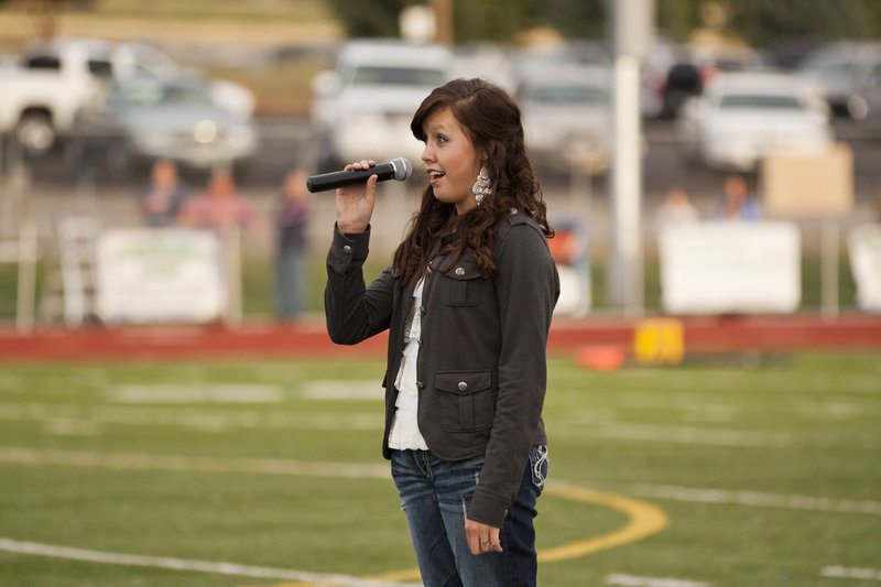Image: Taylor Regen sings the National Anthem