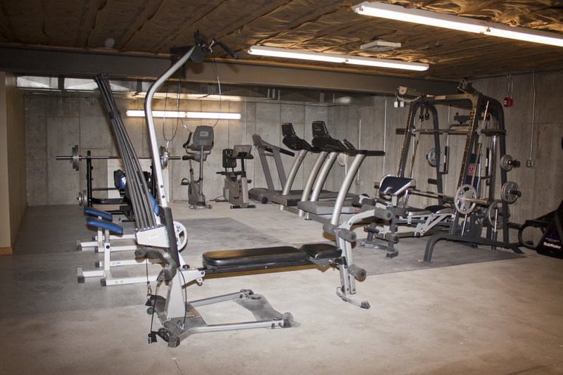 Image: Exercise facility in the basement of the police station.  Much of this equipment has been furnished by the officers.  Some of the treadmills were donated by the recreation center when they replaced them with newer equipment.