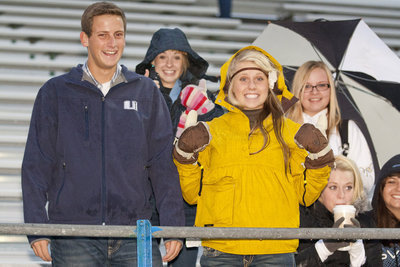 Image: Danica Webb and crew arrive early and brave the drizzling rain to support the Bobcats against the Roy Royals.