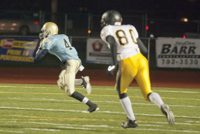 Image: 
    	Sophomore quarterback Braxton Goderidge managed the game like a veteran.
    