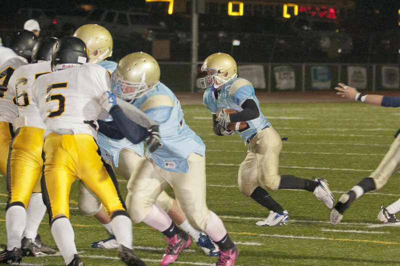 Image: Alex Watts (#12) had a big ground game on Friday.  Watts picked up 80 yards on 20 carries.