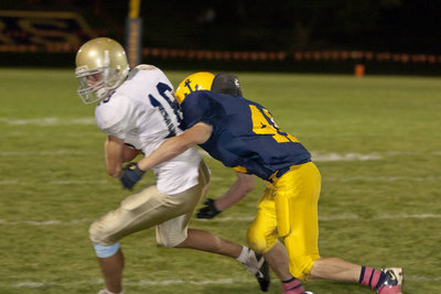 Image: Mitch Larson (#18) hauls in another pass.