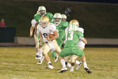 Image: Nick Carver (#8) with a keeper.  Nick threw 4 touchdowns, and ran in for 1.