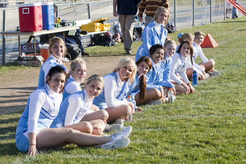 Image: The cheerleaders get ready to watch the Vistauns perform at halftime.