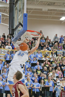 Image: Slam!  Casey Oliverson (32) takes it to the hoop.
