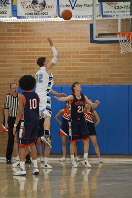 Image: Casey Oliverson (32) shoots for two.