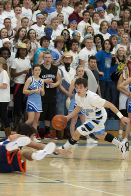 Image: Dallen Godfrey (5) puts a move on the Mustangs.
