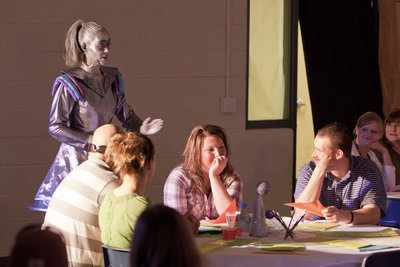 Image: Ultrakate 3000 (Emily Shirley) answers questions of some dinner goers.