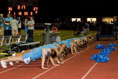 Image: Many nights like this will make the Bobcat Cheer Squad the buffest in the state.  One set of push-ups that totaled 150 on the night.