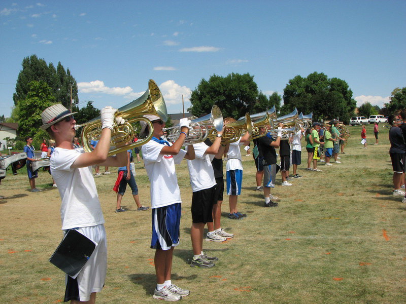 Image: The Sky View High School Marching Band practicing their new show “Rhythm of the Rain Forest.”