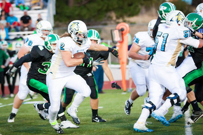 Image: Dane Anderson (2) gets a key block from Colton Durant (51)