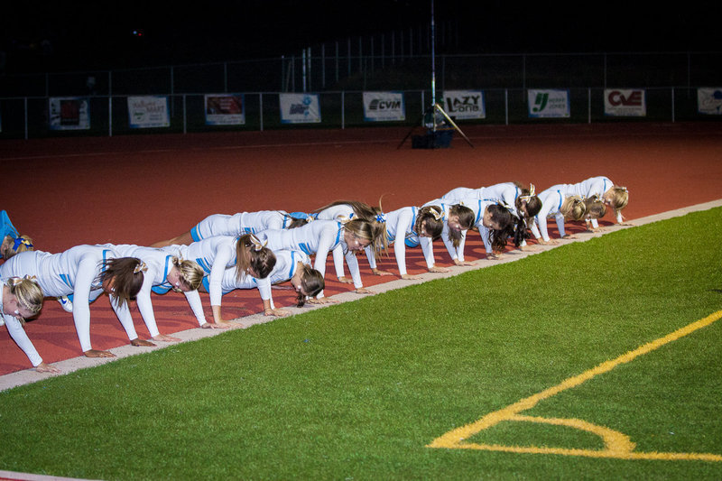 Image: On of many sets of pushups done by the cheerleaders